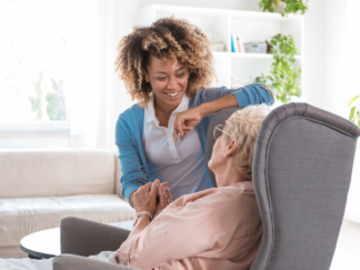 live-in care assistant with service user in their home